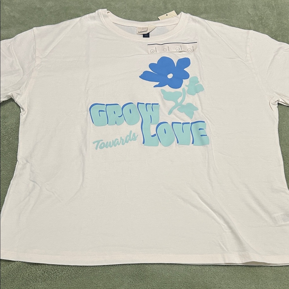 Universal White Tee with Blue Floral Design